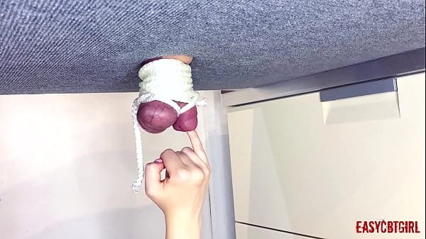 Pervert girl tied a dick with balls and pulls for them on the milking table  AnnyCandy Painboy